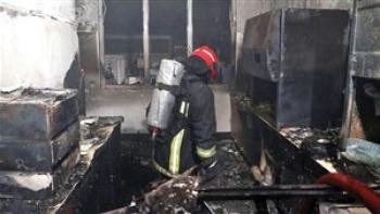 مرد نقابدار عامل آتش سوزی عمدی آزمایشگاه پارسیان مشهد