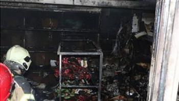 نجات مادر و دو فرزندش از میان شعله های آتش در پیتزا فروشی
