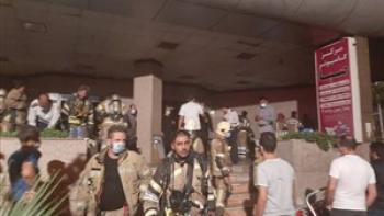 اتش سوزی در برج مسکونی-تجاری در خیابان آزادی / نجات ۸۰ نفر از میان دود و آتش